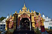 Myanmar - Mandalay, Kuthodaw Pagoda. 729 white pitaka pagodas contain the Tipitaka, the sacred texts of Theravada Buddhism. 